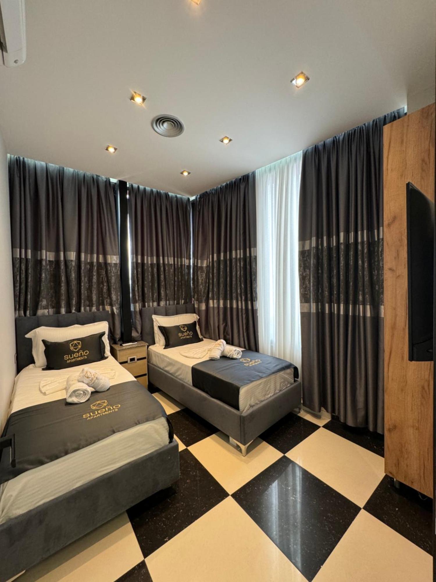 Sueno Apartments & Suites Тирана Номер фото